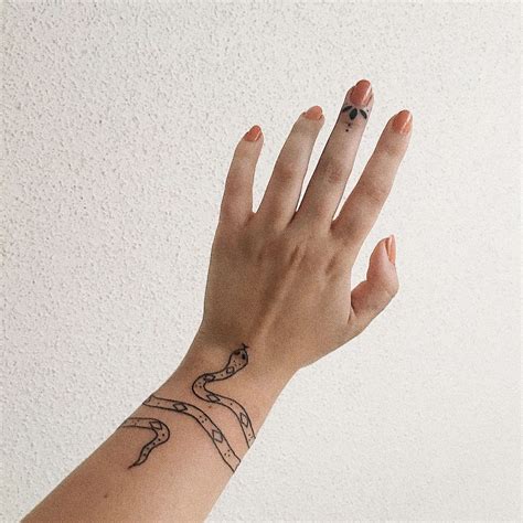 snake wrist tattoo